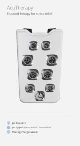 AcuTherapy device: white rectangular unit with eight round jet ports for focused stress-relief therapy.